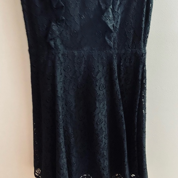 Black lace dress. Above the knee with ruffles. - Picture 3 of 3